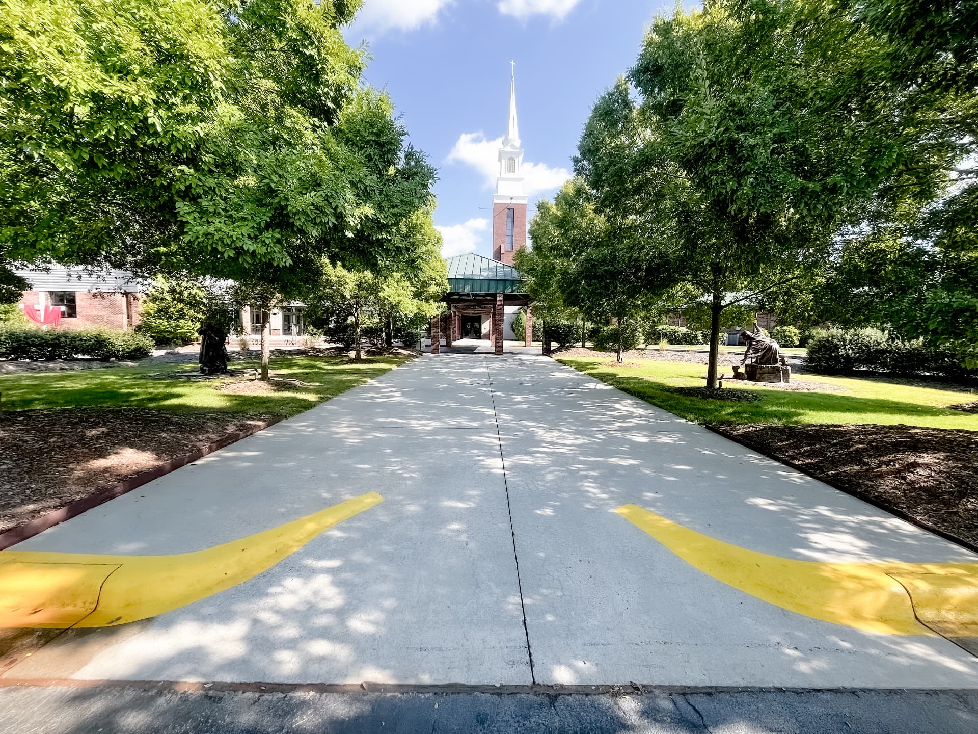 Clean commercial entrance and concrete drive