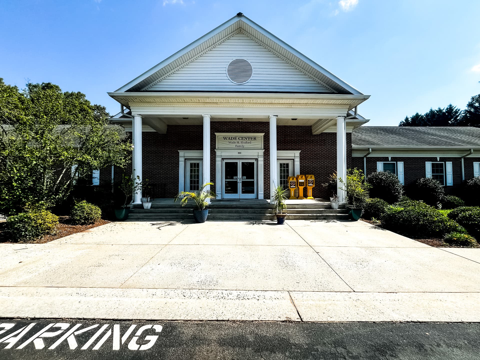 Office building entrance and concrete walkway