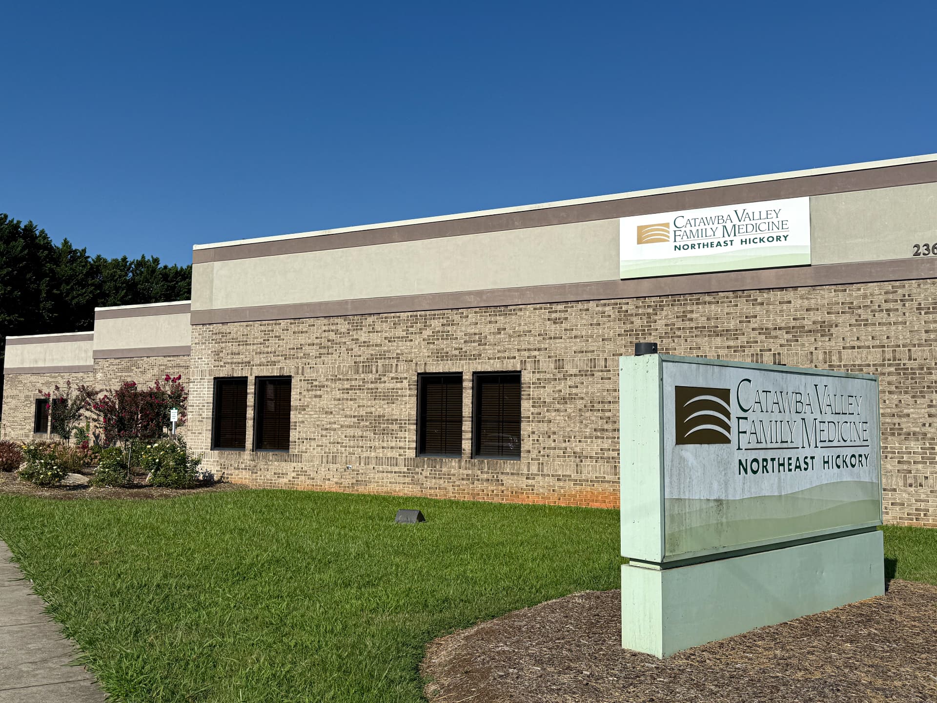 Credit union building exterior and landscaped grounds